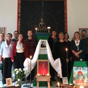 Gathering at Abhayaloka retreat centre Finland with shrine to remember Bhante