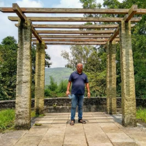 In front of ancient caves