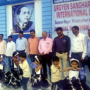At the inauguration of the school: the founder, Sandeep Janardan Rakshit, is pictured in the centre in a pink shirt