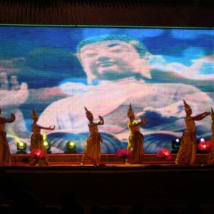 Thai dancers and psychedelic Buddha