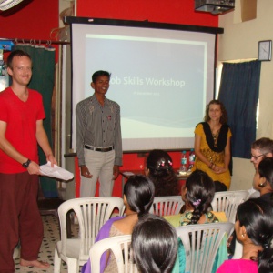 Paul and Helen at workshop and in middle Satish is translator...
