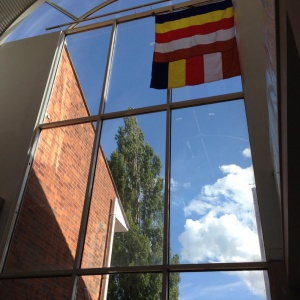 Buddhist flag hoisted above the library